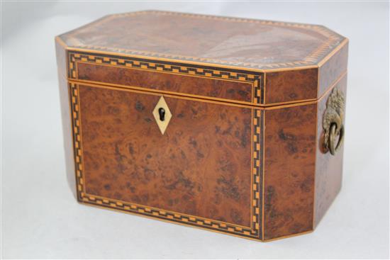 A Victorian birds eye yew elongated octagonal tea caddy, 8.5in.